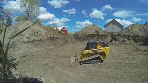 grading clay with skid steer|skid steer final grading.